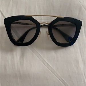 Prada sunglasses. Guaranteed authentic.